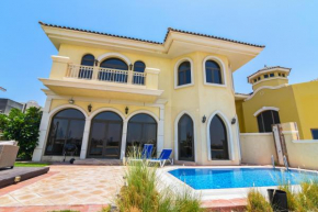 Beautiful Palm Villa with Private Beach & Pool